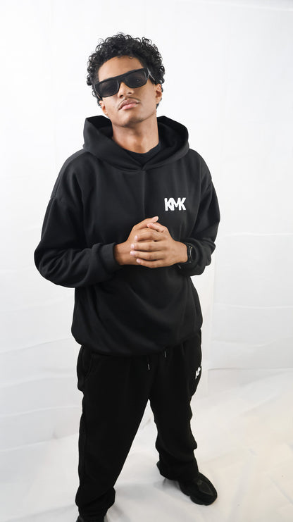L'ensemble: Sweat à Capuche / Pantalon de Jogging.