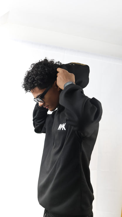 L'ensemble: Sweat à Capuche / Pantalon de Jogging.