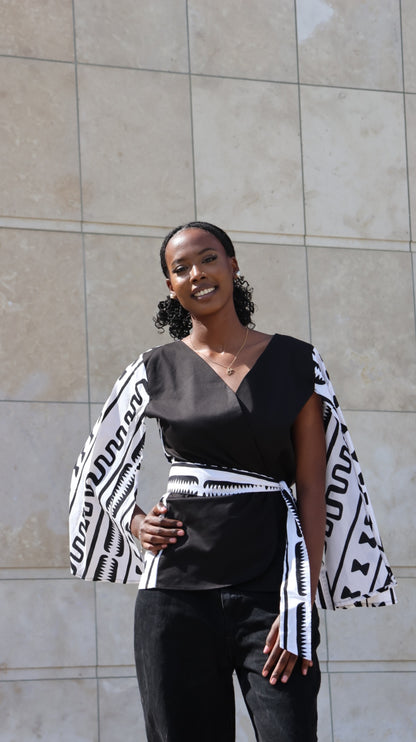 Veste noir à manche blanche