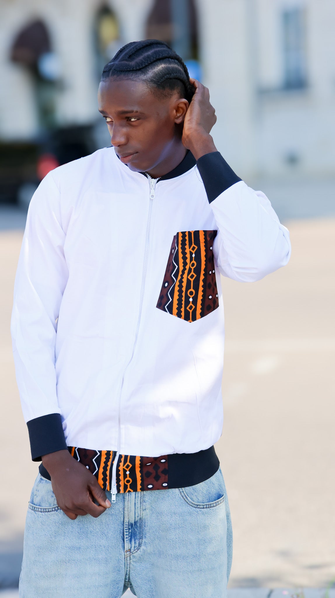 bombers blanc avec détail motif et poche avant