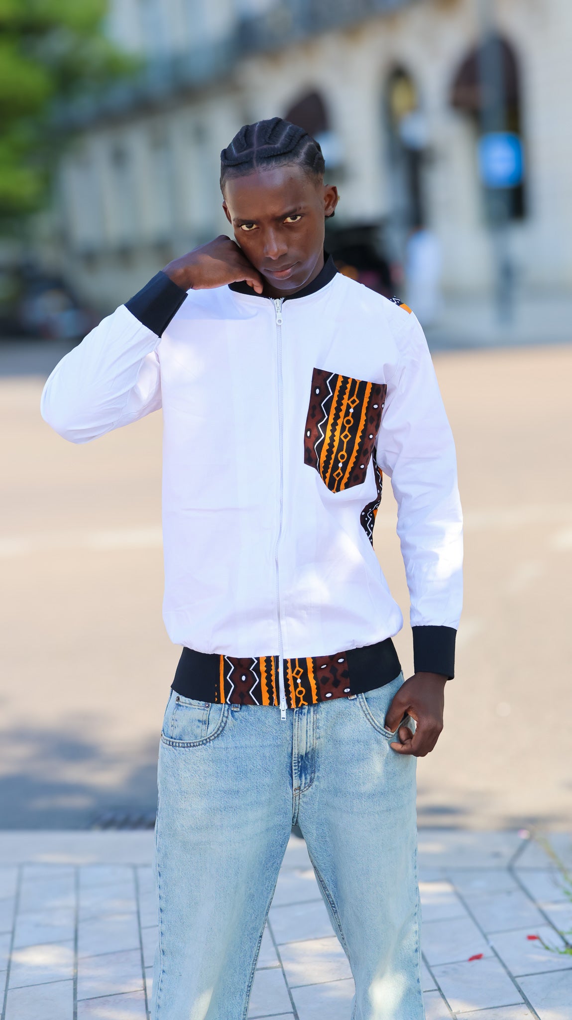 bombers blanc avec détail motif et poche avant