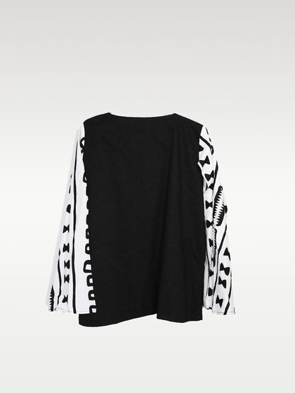 Veste noir à manche blanche